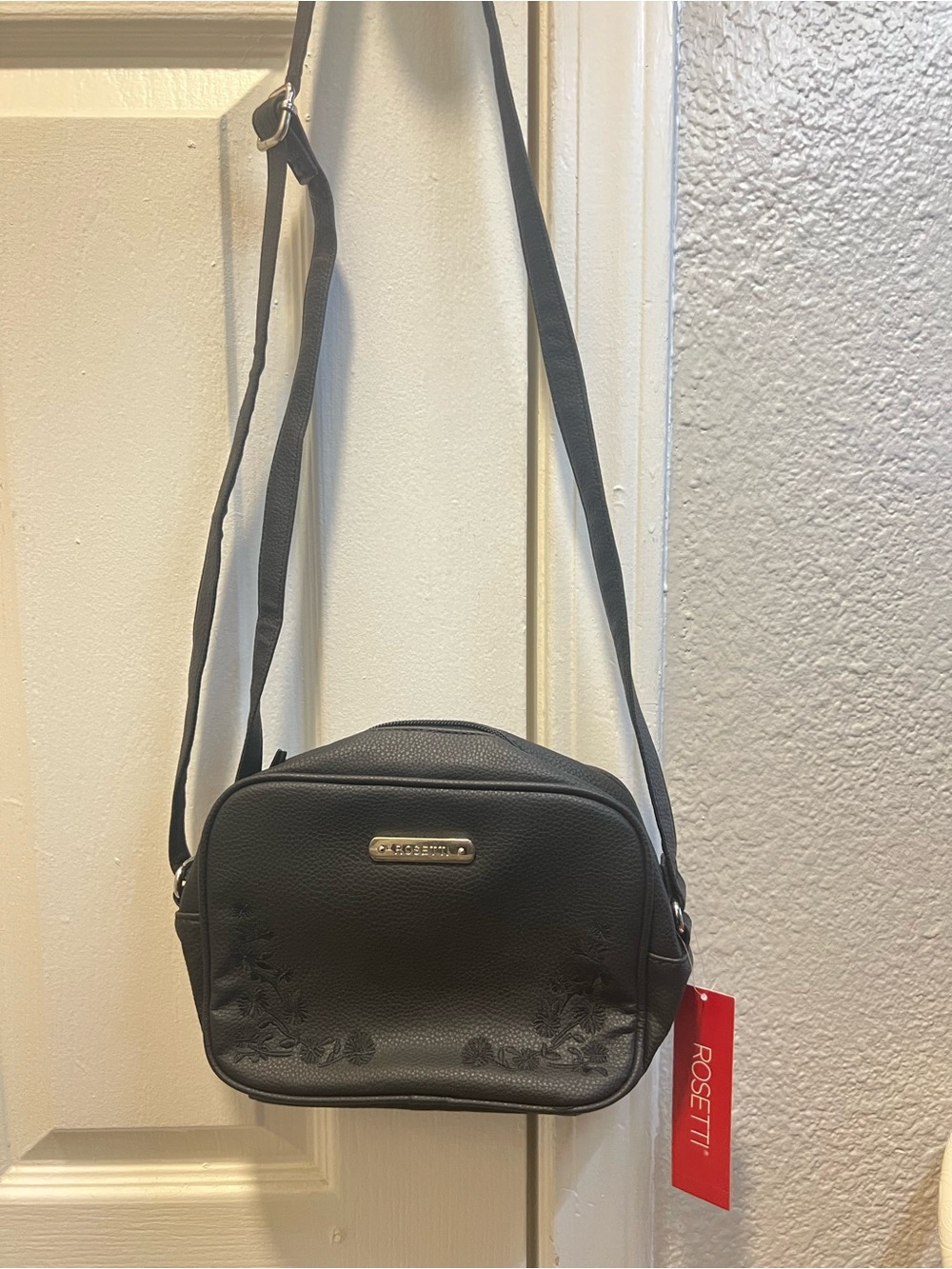 Rosetti Black Faux Leather Floral Crossbody Bag